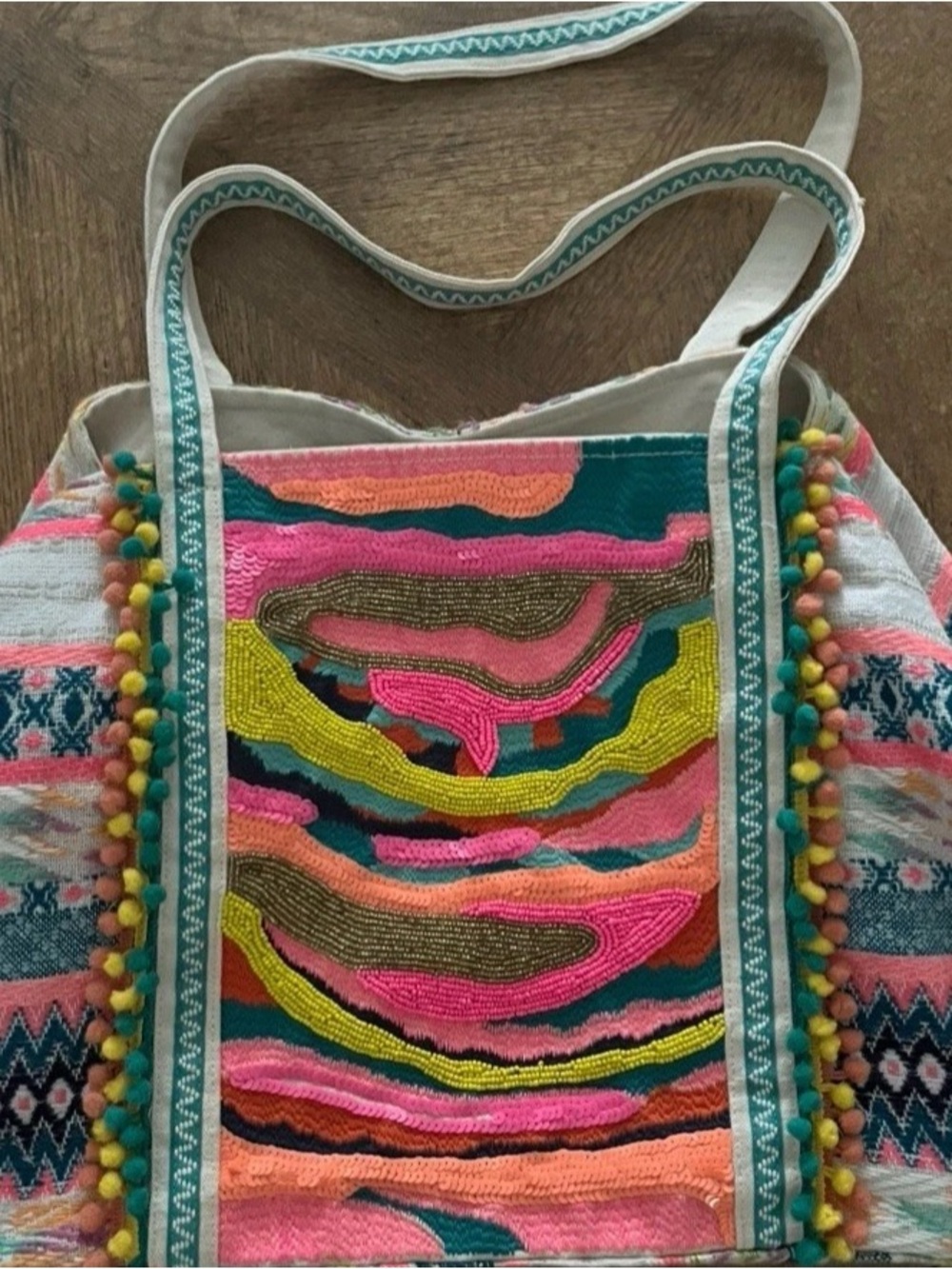 America & Beyond Vibrant Multicolor Embroidered Hobo Bag with Pom-Pom Trim beach